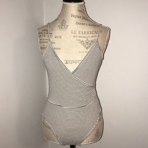 Black and white striped body suit